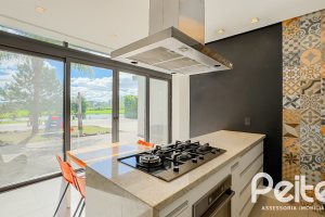 Casa em Condomínio à venda com 385m², 4 dormitórios, 4 suítes, 4 vagas, no bairro Terra Ville em PORTO ALEGRE