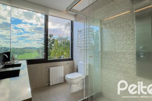 Casa em Condomínio à venda com 385m², 4 dormitórios, 4 suítes, 4 vagas, no bairro Terra Ville em PORTO ALEGRE