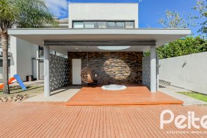 Casa em Condomínio à venda com 385m², 4 dormitórios, 4 suítes, 4 vagas, no bairro Terra Ville em PORTO ALEGRE