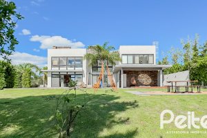 Casa em Condomínio à venda com 385m², 4 dormitórios, 4 suítes, 4 vagas, no bairro Terra Ville em PORTO ALEGRE