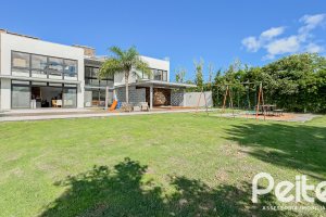 Casa em Condomínio à venda com 385m², 4 dormitórios, 4 suítes, 4 vagas, no bairro Terra Ville em PORTO ALEGRE