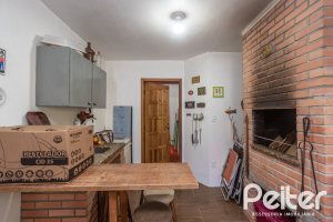 Casa à venda com 226m², 3 dormitórios, 1 suíte, 2 vagas, no bairro Tristeza em Porto Alegre