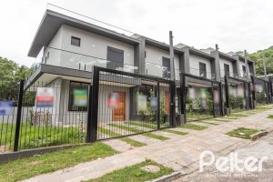 Casa em Condomínio à venda com 96m², 3 dormitórios, 1 suíte, 2 vagas, no bairro Tristeza em Porto Alegre