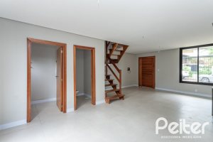 Casa em Condomínio à venda com 96m², 3 dormitórios, 1 suíte, 2 vagas, no bairro Tristeza em Porto Alegre