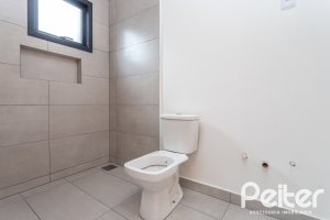 Casa em Condomínio à venda com 96m², 3 dormitórios, 1 suíte, 2 vagas, no bairro Tristeza em Porto Alegre