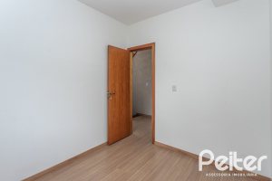 Casa em Condomínio à venda com 96m², 3 dormitórios, 1 suíte, 2 vagas, no bairro Tristeza em Porto Alegre