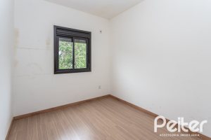 Casa em Condomínio à venda com 96m², 3 dormitórios, 1 suíte, 2 vagas, no bairro Tristeza em Porto Alegre