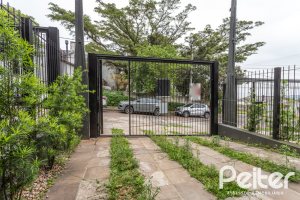 Casa em Condomínio à venda com 96m², 3 dormitórios, 1 suíte, 2 vagas, no bairro Tristeza em Porto Alegre