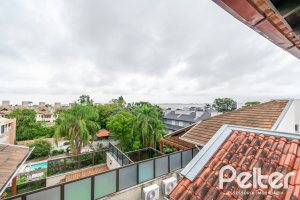 Casa em Condomínio à venda com 204m², 4 dormitórios, 1 suíte, 3 vagas, no bairro Tristeza em Porto Alegre
