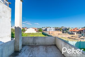 Casa à venda com 67m², 2 dormitórios, 1 vaga, no bairro Hípica em Porto Alegre