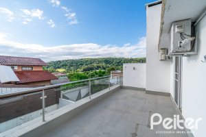 Casa em Condomínio à venda com 195m², 3 dormitórios, 1 suíte, 4 vagas, no bairro Vila Nova em Porto Alegre