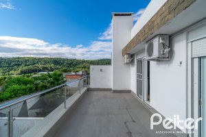 Casa em Condomínio à venda com 195m², 3 dormitórios, 1 suíte, 4 vagas, no bairro Vila Nova em Porto Alegre