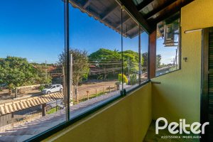 Casa à venda com 165m², 3 dormitórios, 1 suíte, 2 vagas, no bairro Ipanema em Porto Alegre