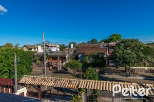 Casa à venda com 165m², 3 dormitórios, 1 suíte, 2 vagas, no bairro Ipanema em Porto Alegre