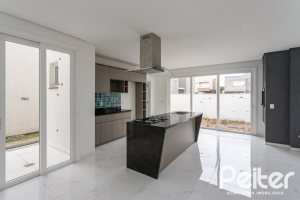 Casa em Condomínio à venda com 154m², 3 dormitórios, 3 suítes, 2 vagas, no bairro Hípica em PORTO ALEGRE