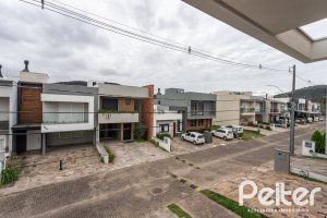 Casa em Condomínio à venda com 154m², 3 dormitórios, 3 suítes, 2 vagas, no bairro Hípica em PORTO ALEGRE