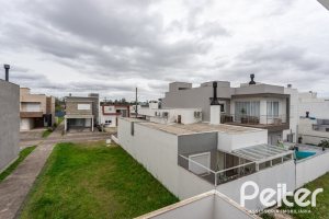 Casa em Condomínio à venda com 154m², 3 dormitórios, 3 suítes, 2 vagas, no bairro Hípica em PORTO ALEGRE