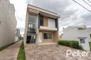 Casa em Condomínio à venda com 154m², 3 dormitórios, 3 suítes, 2 vagas, no bairro Hípica em PORTO ALEGRE