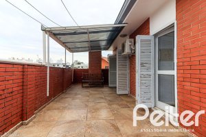 Casa à venda com 290m², 3 dormitórios, 1 suíte, 4 vagas, no bairro Jardim Isabel em Porto Alegre