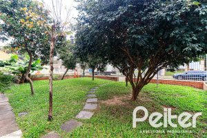 Casa à venda com 290m², 3 dormitórios, 1 suíte, 4 vagas, no bairro Jardim Isabel em Porto Alegre