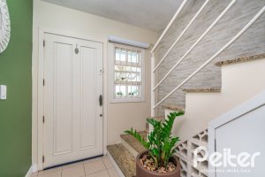 Casa em Condomínio à venda com 179m², 3 dormitórios, 1 suíte, 3 vagas, no bairro Tristeza em Porto Alegre