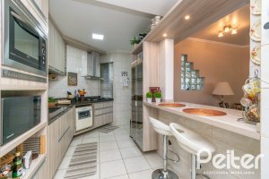 Casa em Condomínio à venda com 179m², 3 dormitórios, 1 suíte, 3 vagas, no bairro Tristeza em Porto Alegre