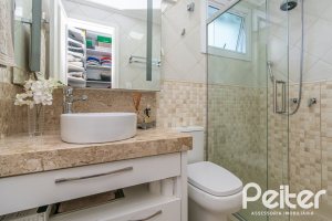 Casa em Condomínio à venda com 179m², 3 dormitórios, 1 suíte, 3 vagas, no bairro Tristeza em Porto Alegre