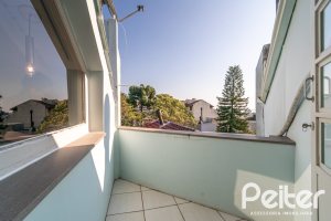 Casa em Condomínio à venda com 179m², 3 dormitórios, 1 suíte, 3 vagas, no bairro Tristeza em Porto Alegre