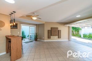 Casa em Condomínio à venda com 179m², 3 dormitórios, 1 suíte, 3 vagas, no bairro Tristeza em Porto Alegre