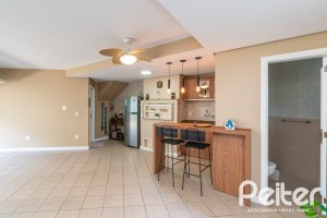 Casa em Condomínio à venda com 179m², 3 dormitórios, 1 suíte, 3 vagas, no bairro Tristeza em Porto Alegre