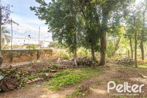 Casa à venda com 120m², 2 dormitórios, 5 vagas, no bairro Tristeza em Porto Alegre