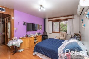 Casa à venda com 495m², 3 dormitórios, 2 suítes, 2 vagas, no bairro Jardim Isabel em Porto Alegre