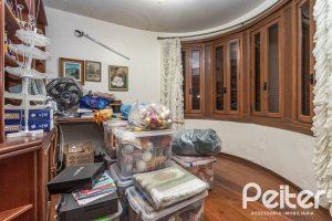 Casa à venda com 495m², 3 dormitórios, 2 suítes, 2 vagas, no bairro Jardim Isabel em Porto Alegre