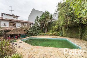 Casa à venda com 495m², 3 dormitórios, 2 suítes, 2 vagas, no bairro Jardim Isabel em Porto Alegre