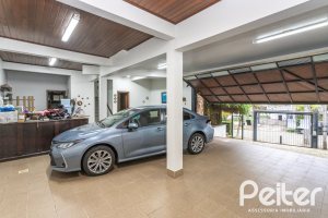 Casa à venda com 495m², 3 dormitórios, 2 suítes, 2 vagas, no bairro Jardim Isabel em Porto Alegre