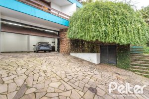 Casa à venda com 495m², 3 dormitórios, 2 suítes, 2 vagas, no bairro Jardim Isabel em Porto Alegre