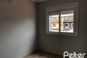 Casa à venda com 115m², 3 dormitórios, 1 suíte, 2 vagas, no bairro Hípica em Porto Alegre