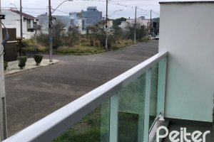 Casa à venda com 115m², 3 dormitórios, 1 suíte, 2 vagas, no bairro Hípica em Porto Alegre