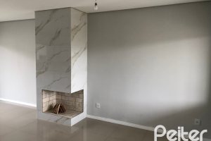 Casa à venda com 115m², 3 dormitórios, 1 suíte, 2 vagas, no bairro Hípica em Porto Alegre