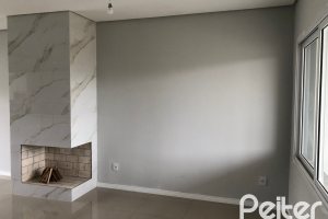 Casa à venda com 115m², 3 dormitórios, 1 suíte, 2 vagas, no bairro Hípica em Porto Alegre