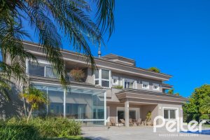 Casa em Condomínio à venda com 1400m², 5 dormitórios, 4 suítes, 10 vagas, no bairro Cavalhada em PORTO ALEGRE