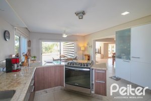 Casa em Condomínio à venda com 1400m², 5 dormitórios, 4 suítes, 10 vagas, no bairro Cavalhada em PORTO ALEGRE