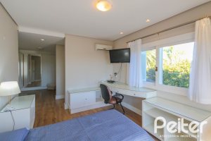 Casa em Condomínio à venda com 1400m², 5 dormitórios, 4 suítes, 10 vagas, no bairro Cavalhada em PORTO ALEGRE