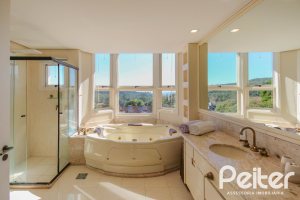 Casa em Condomínio à venda com 1400m², 5 dormitórios, 4 suítes, 10 vagas, no bairro Cavalhada em PORTO ALEGRE