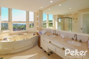 Casa em Condomínio à venda com 1400m², 5 dormitórios, 4 suítes, 10 vagas, no bairro Cavalhada em PORTO ALEGRE