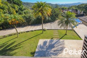 Casa em Condomínio à venda com 1400m², 5 dormitórios, 4 suítes, 10 vagas, no bairro Cavalhada em PORTO ALEGRE