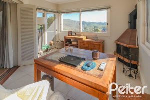 Casa em Condomínio à venda com 1400m², 5 dormitórios, 4 suítes, 10 vagas, no bairro Cavalhada em PORTO ALEGRE