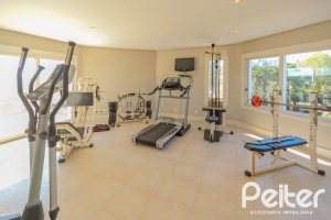 Casa em Condomínio à venda com 1400m², 5 dormitórios, 4 suítes, 10 vagas, no bairro Cavalhada em PORTO ALEGRE