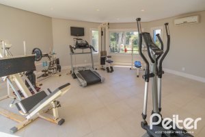 Casa em Condomínio à venda com 1400m², 5 dormitórios, 4 suítes, 10 vagas, no bairro Cavalhada em PORTO ALEGRE