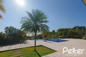 Casa em Condomínio à venda com 1400m², 5 dormitórios, 4 suítes, 10 vagas, no bairro Cavalhada em PORTO ALEGRE